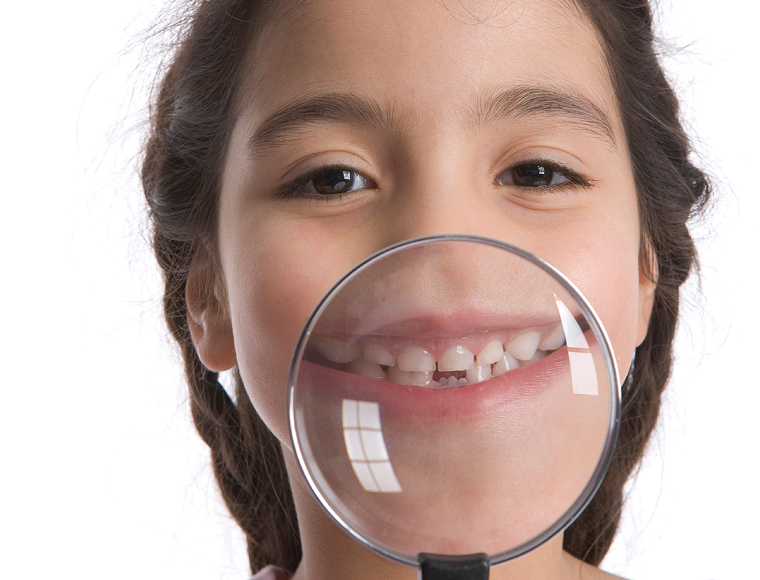 girl with magnifying glass