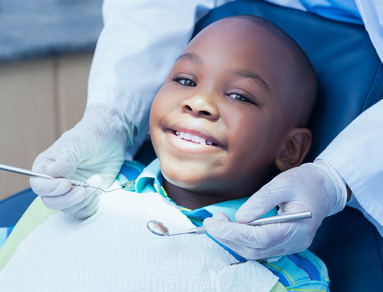 smiling boy at the dentist