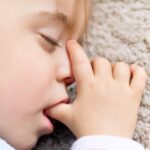 child sucking thumb